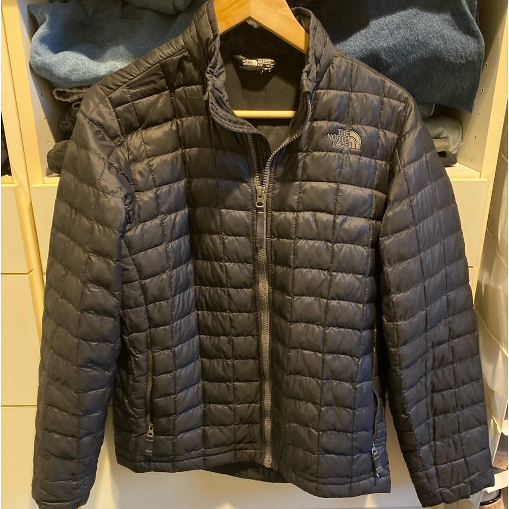 Boys Large North Face puffer jacket.